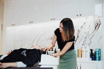 stylist washing hair